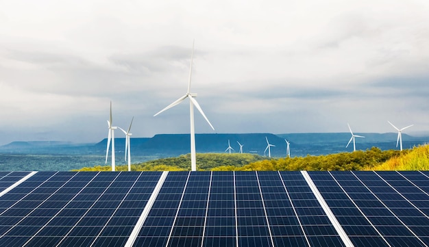 Solar panel and wind turbine blue sky with sun background concept clean power