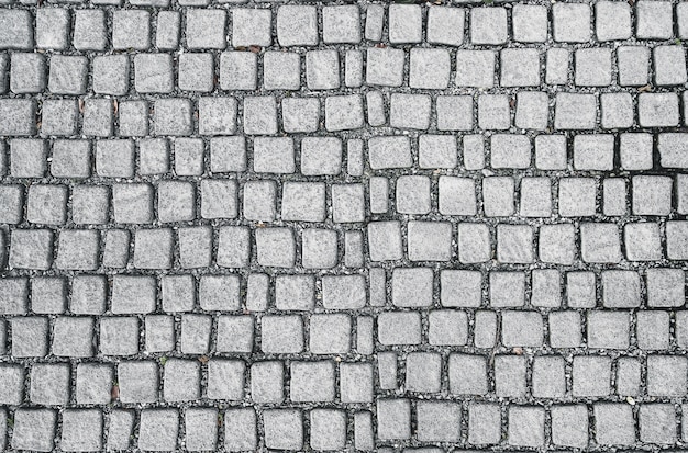 Photo square old cobblestone rock tile pattern pavement floor background