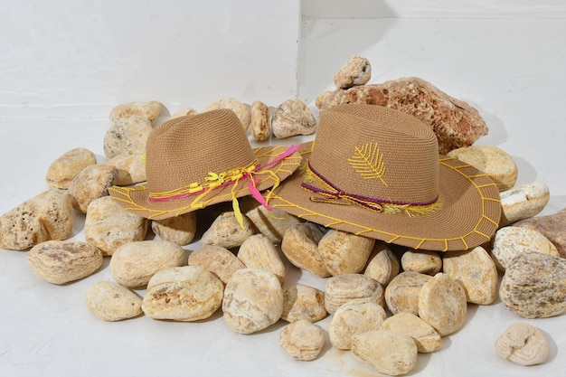 A straw hat spring hat sea shells