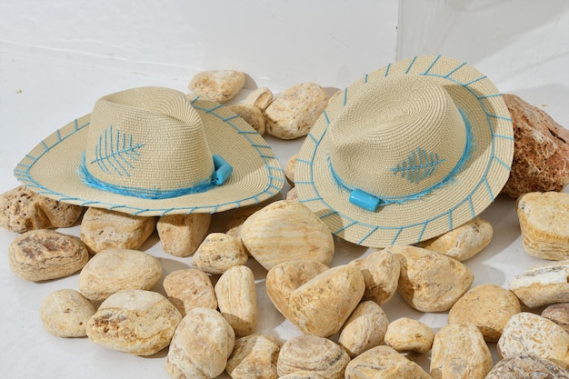 A straw hat spring hat sea shells