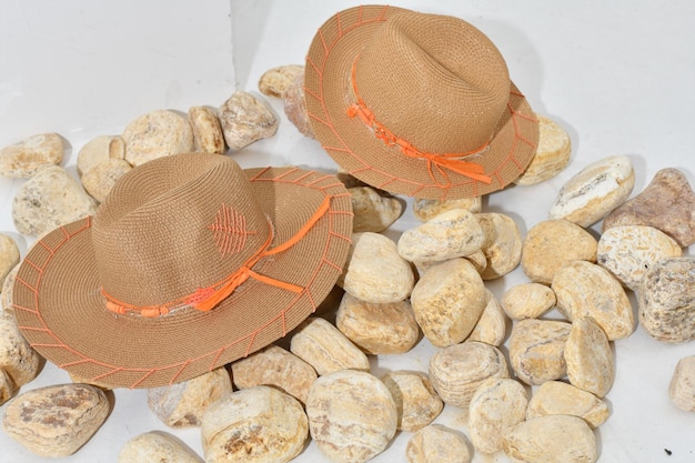 A straw hat spring hat sea shells