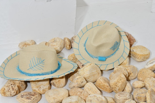 A straw hat spring hat sea shells