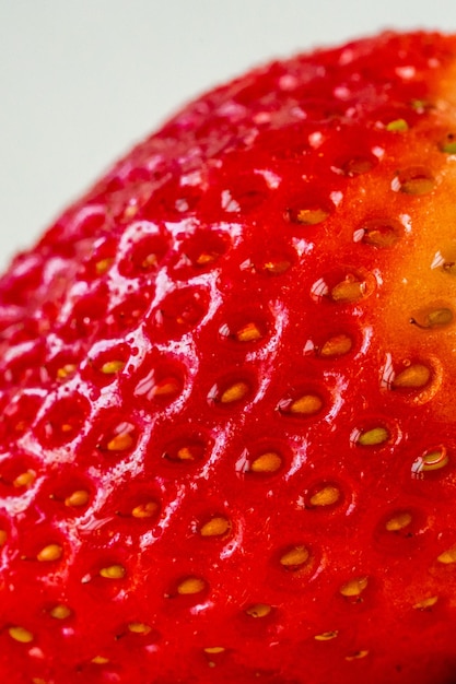 Strawberries close up. Macro strawberry. Berry macro shot. Berry close-up. Strawberry