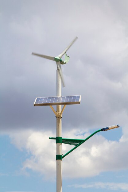 Photo street lamp post with solar panel and a small wind turbine in da