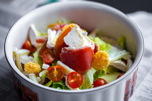 Summer salad. Fresh salad with mozzarella. Lettuce with cherry tomatoes, cucumbers and mozzarella.