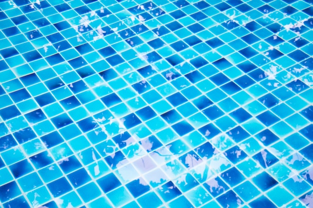 Swimming pools background with reflection water.