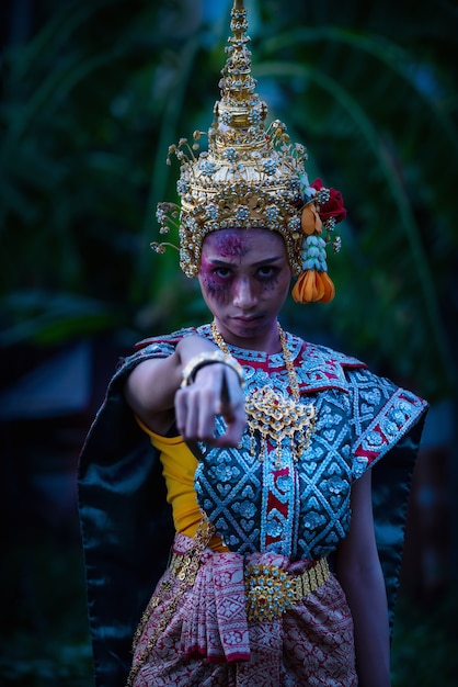 Thai ghost in traditional costume that appear in History, Portrait of asian woman make up ghost face with blood