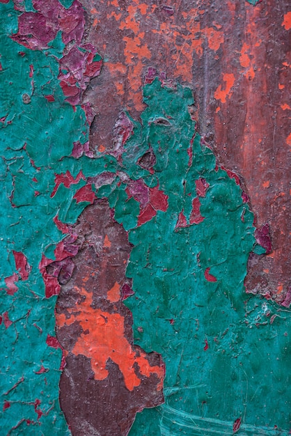 Top view of rusty metal surface with paint peel