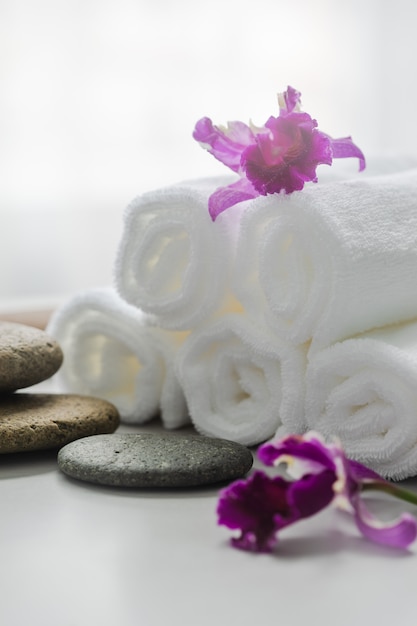 Towels on table with copy space blurred bathroom