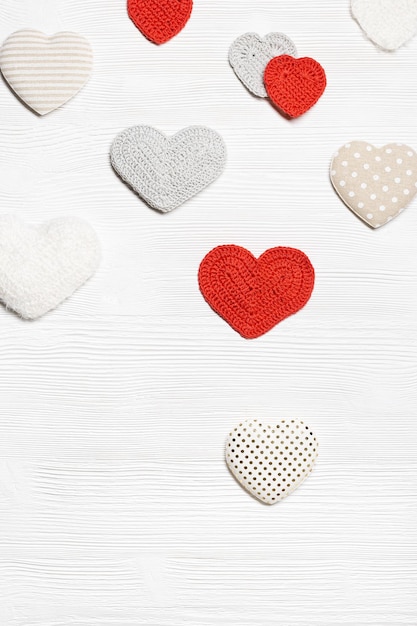 Valentines day concept knit hearts valentine handmade red crochet heart on wooden table diy gift