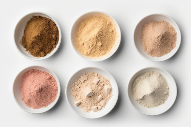 Photo a variety of different powders are on a table