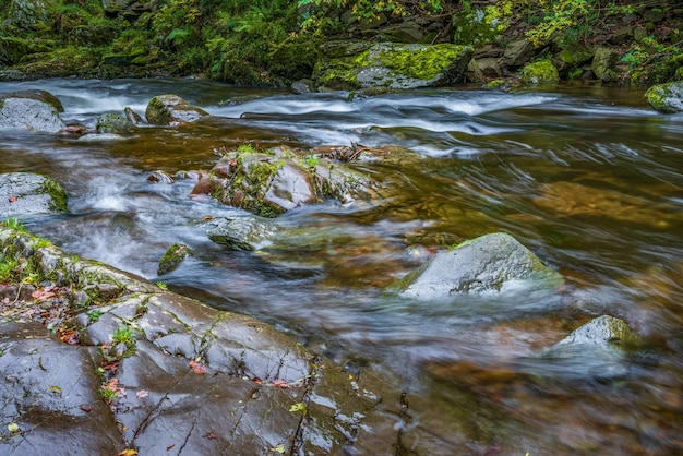 View of fast flowing water in the East Lyn River