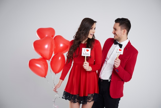 Waist up of couple wearing formal clothes