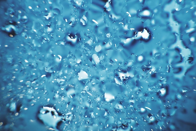 Water drops on a blue background Abstract blue background