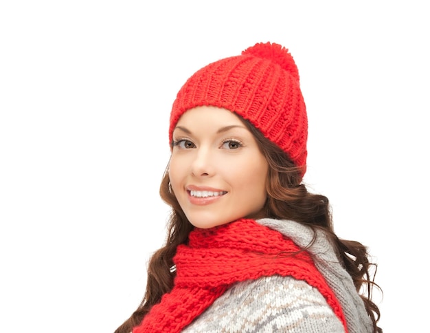 winter, christmas, holidays, clothing and people concept - smiling asian woman in red hat and mittens over white background