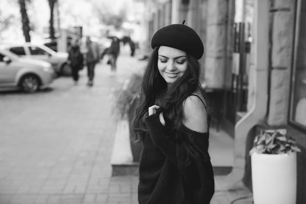 Woman dressed in retro style walking around the city