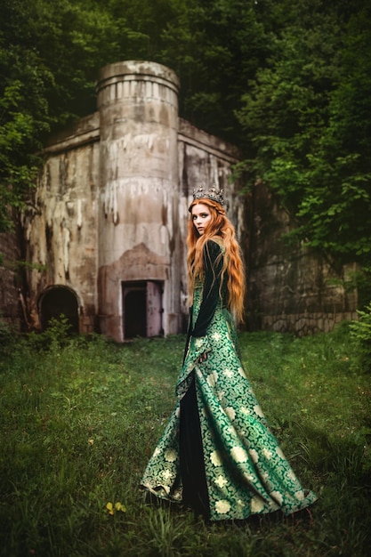 Woman in green medieval dress