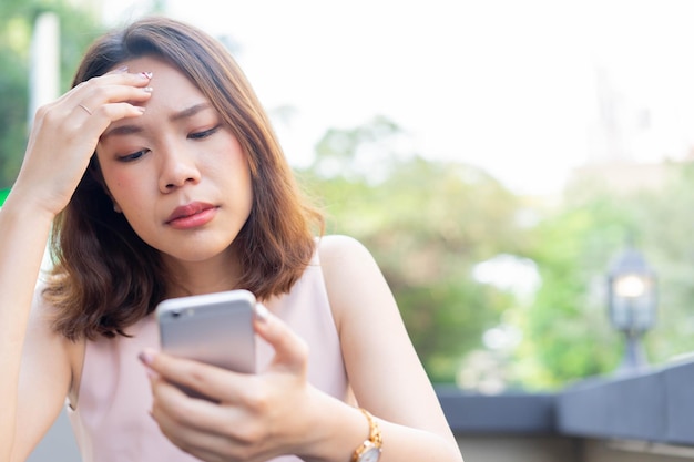 woman reading content or news on social media website with stress feeling