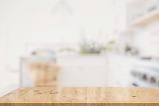 Photo wooden top table in kitchen room interior for product display montage.