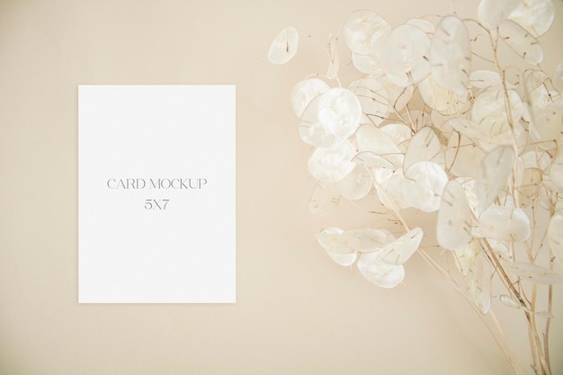 5x7 wedding card mockup with lunaria leaves on beige background