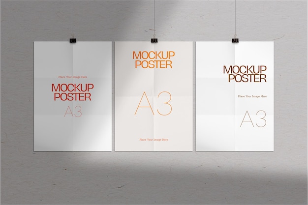 PSD a3 crumpled mockup a series of posters with one being displayed