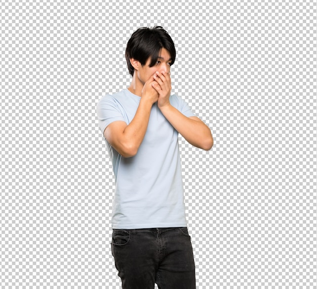 PSD asian man with blue shirt covering mouth and looking to the side