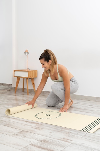 Athletic woman doing yoga at home