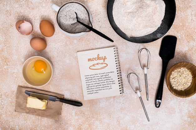 PSD bakery recipe on notebook with ingredients