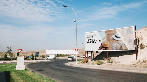 Billboard mockup next to road