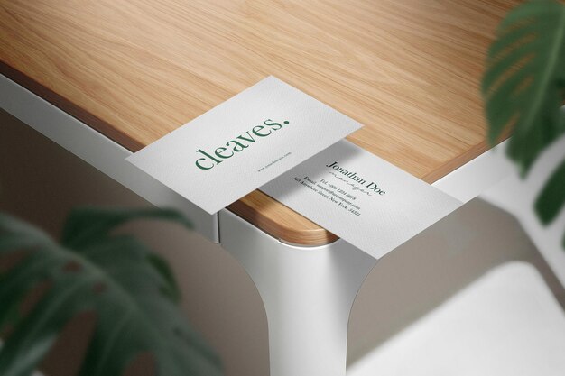 PSD clean minimal business card mockup on top wood table