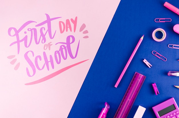 Flat lay back to school with purple supplies