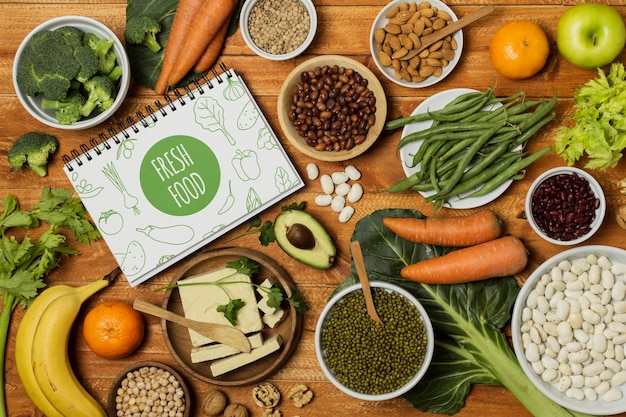 PSD flat lay vegetables with notebook mock-up