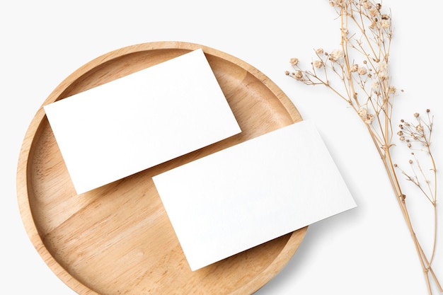 Flyer psd mockup on wooden plate in flat lay style