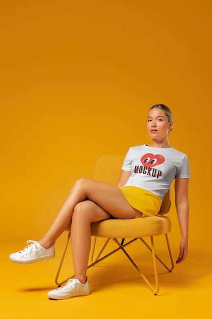 Full shot woman sitting on chair