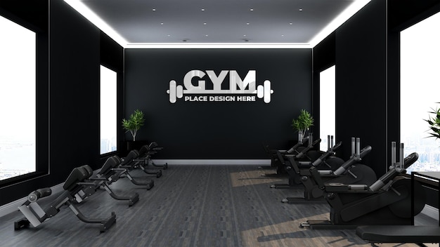 PSD gym logo mockup in the modern gym interior design with black wall