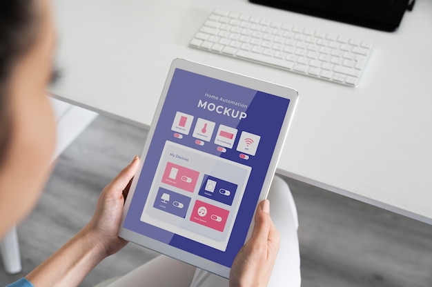 Home automation app mock-up on a tablet