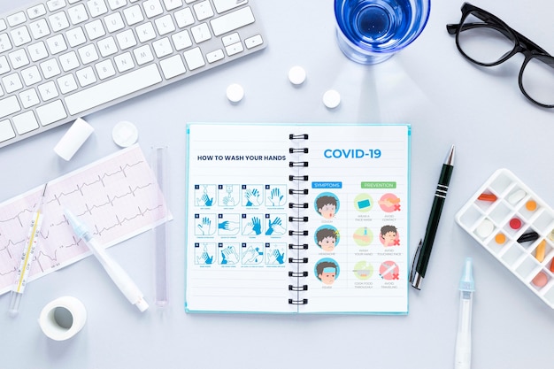 Keyboard with notebook and pills