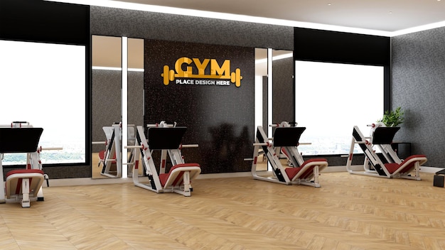 PSD logo mockup in the modern black wall gym for maintaining the body with gym equipment