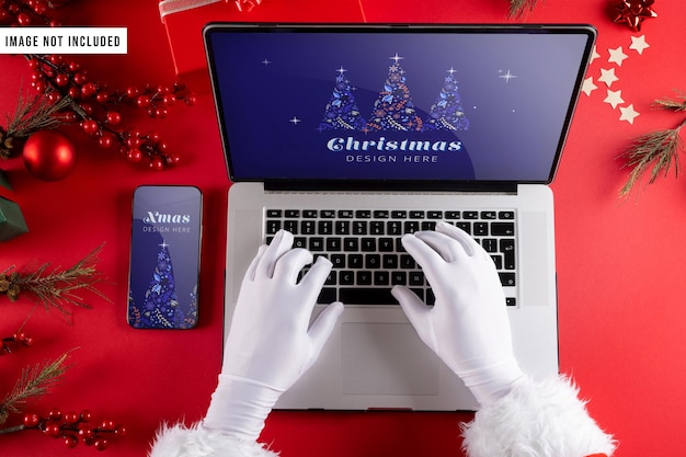 Santa with Laptop and Phone Mockup