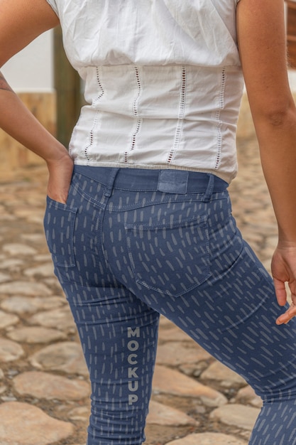 PSD side view woman wearing trendy pants