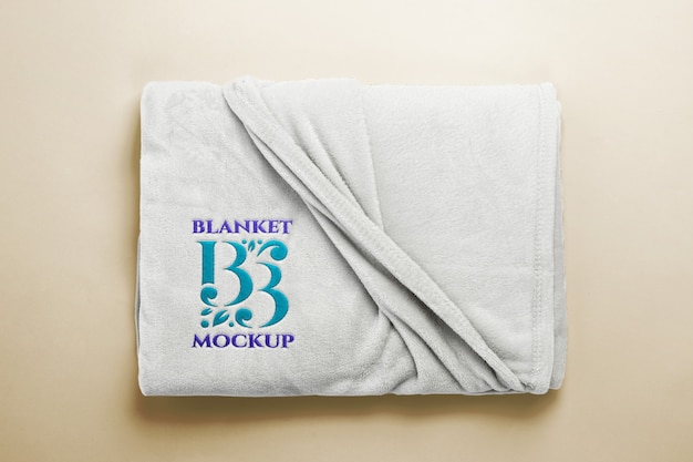 Soft blanket with embroidered logo mock-up