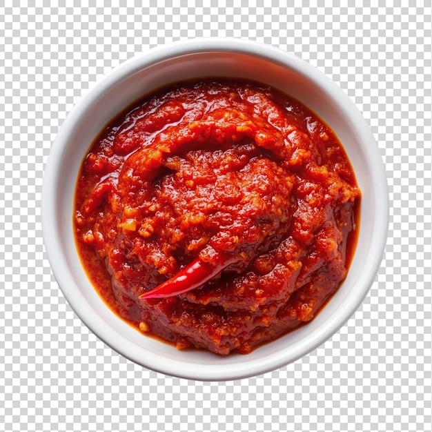 PSD spicy red chili paste on white bowl top view on transparent background