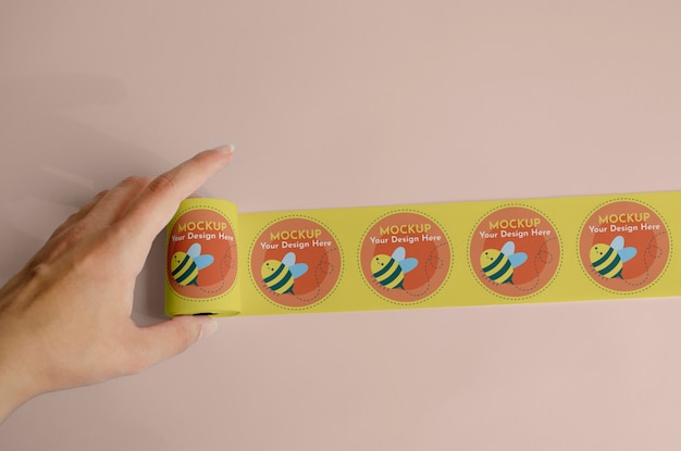 Top view and holding sticker roll with bees