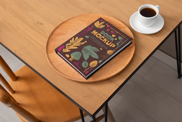 Top view on wooden furniture with book mockup