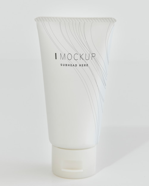 PSD white face cream tube mockup