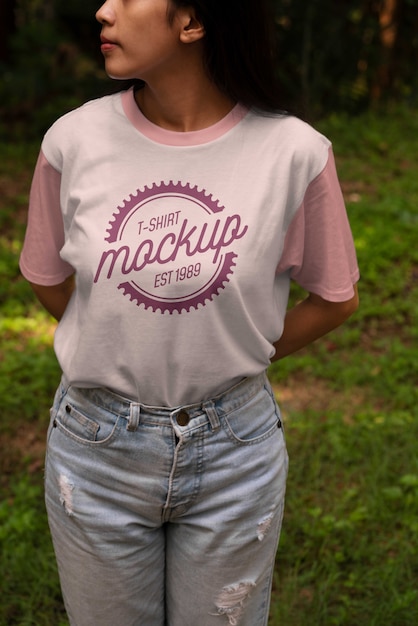 Woman wearing shirt mock-up outdoors in nature