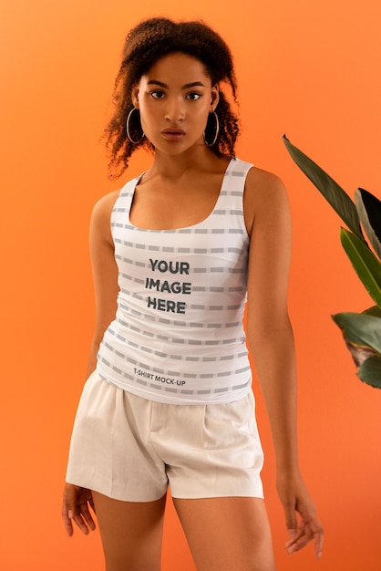 A woman wearing a white tank top mockup