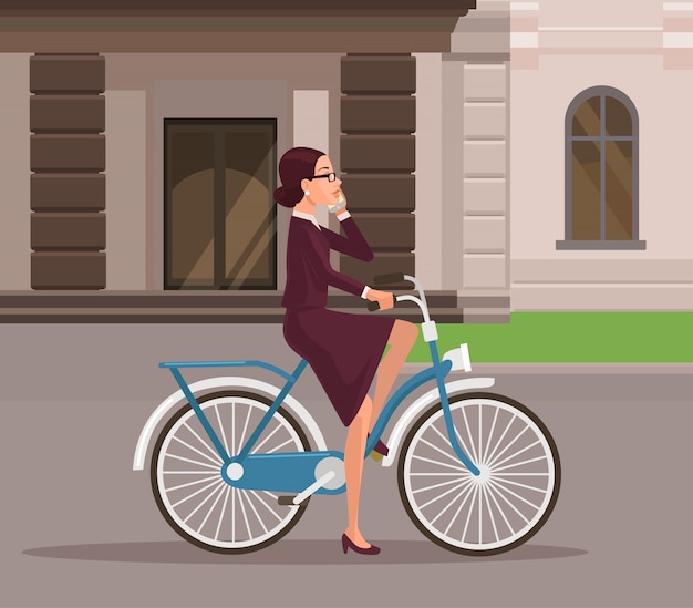 Business woman riding bicycle