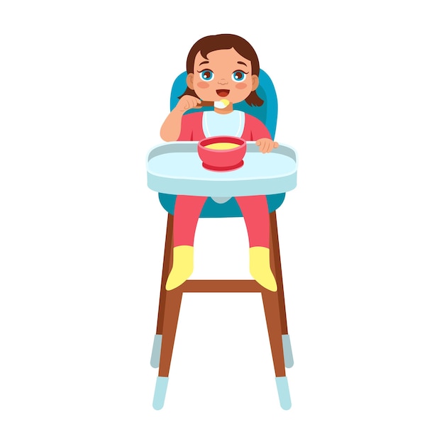 Child learning to eat with a spoon Feeding baby porridge sitting on a chair