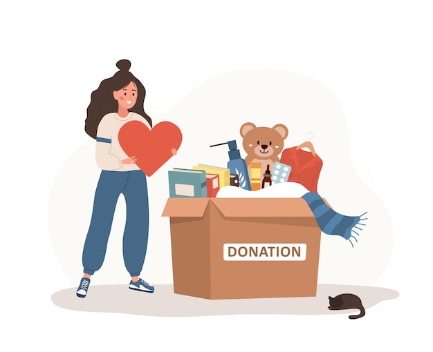 Donation box with clothes toys books and medicines Volunteer woman holding in hands heart